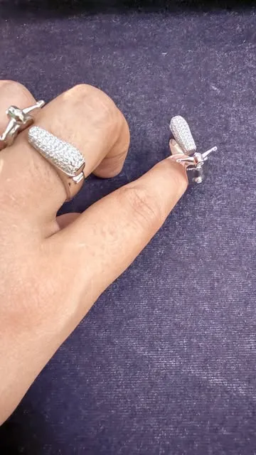 Mohak's pavé zircon silver rings worn on a hand