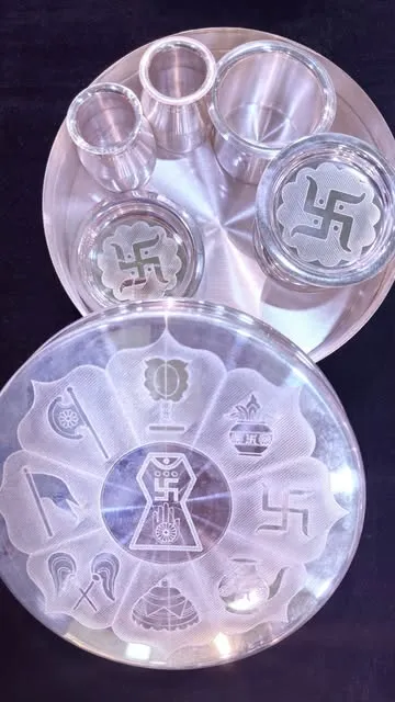 Silver pooja thali set with swastik detailing